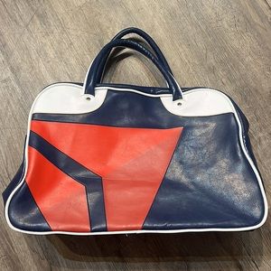 Delta anniversary bag